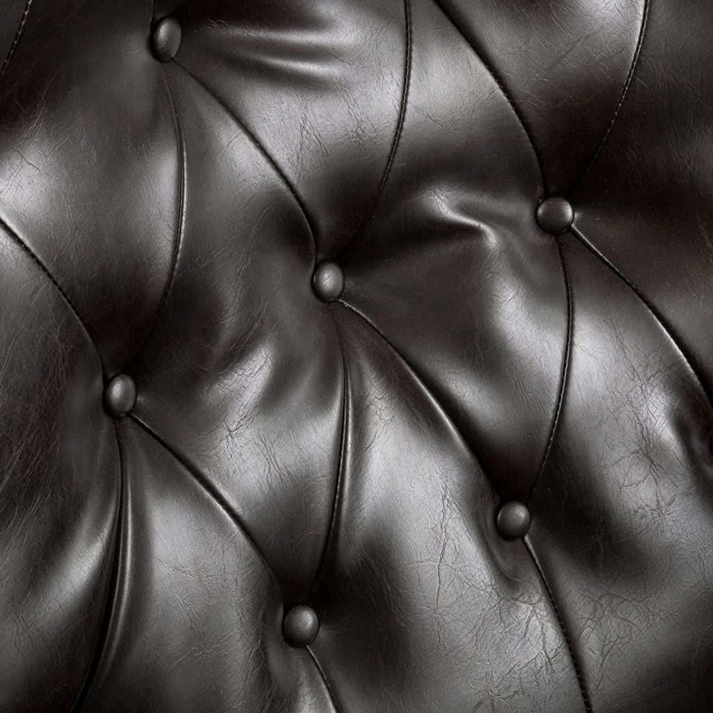club chair leather recliner - close up view of tufted back