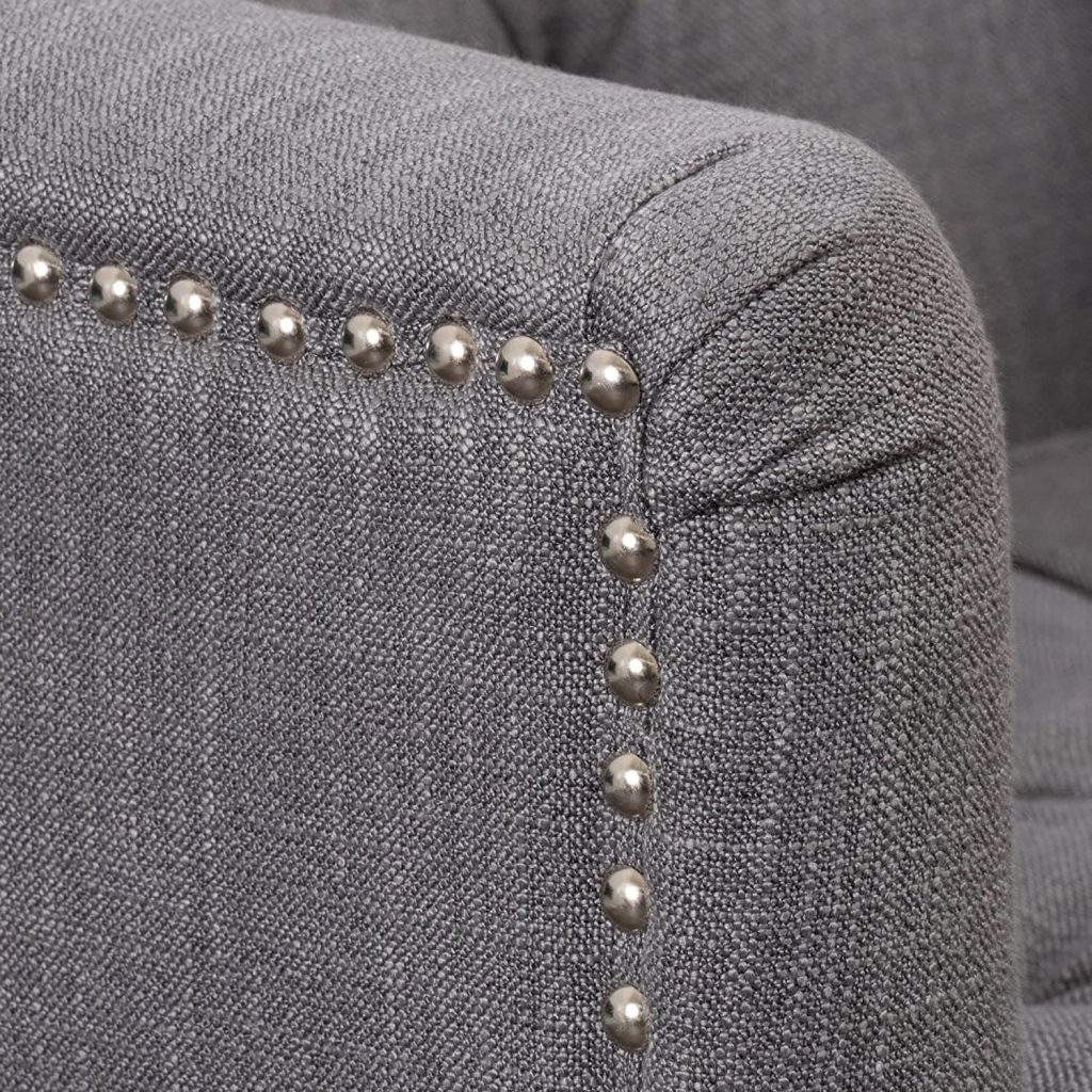 modern club chair - close up view of studded trim